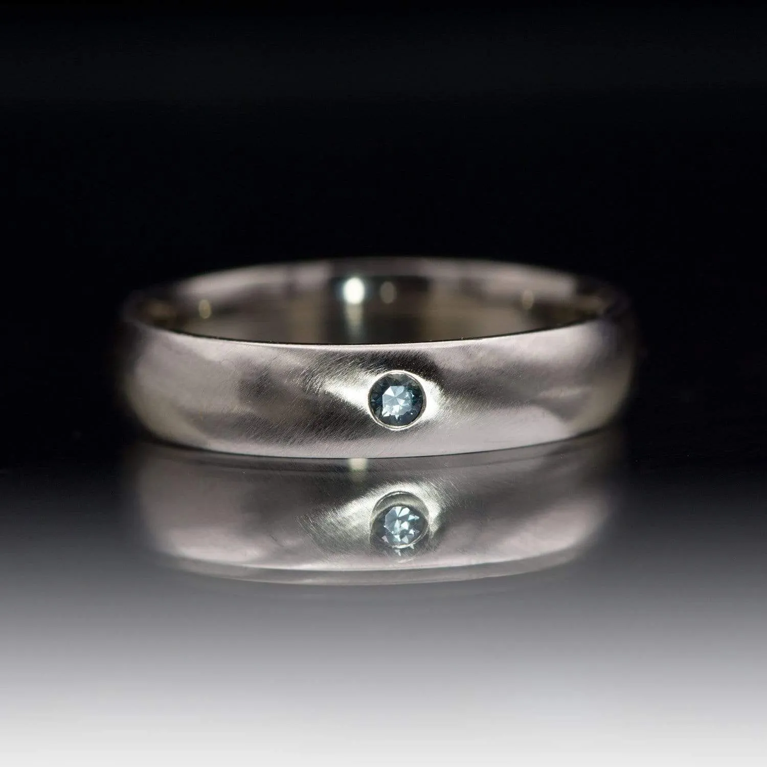 Domed Wedding Band with Flush set Montana Sapphire