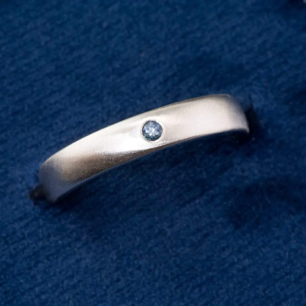 Domed Wedding Band with Flush set Montana Sapphire