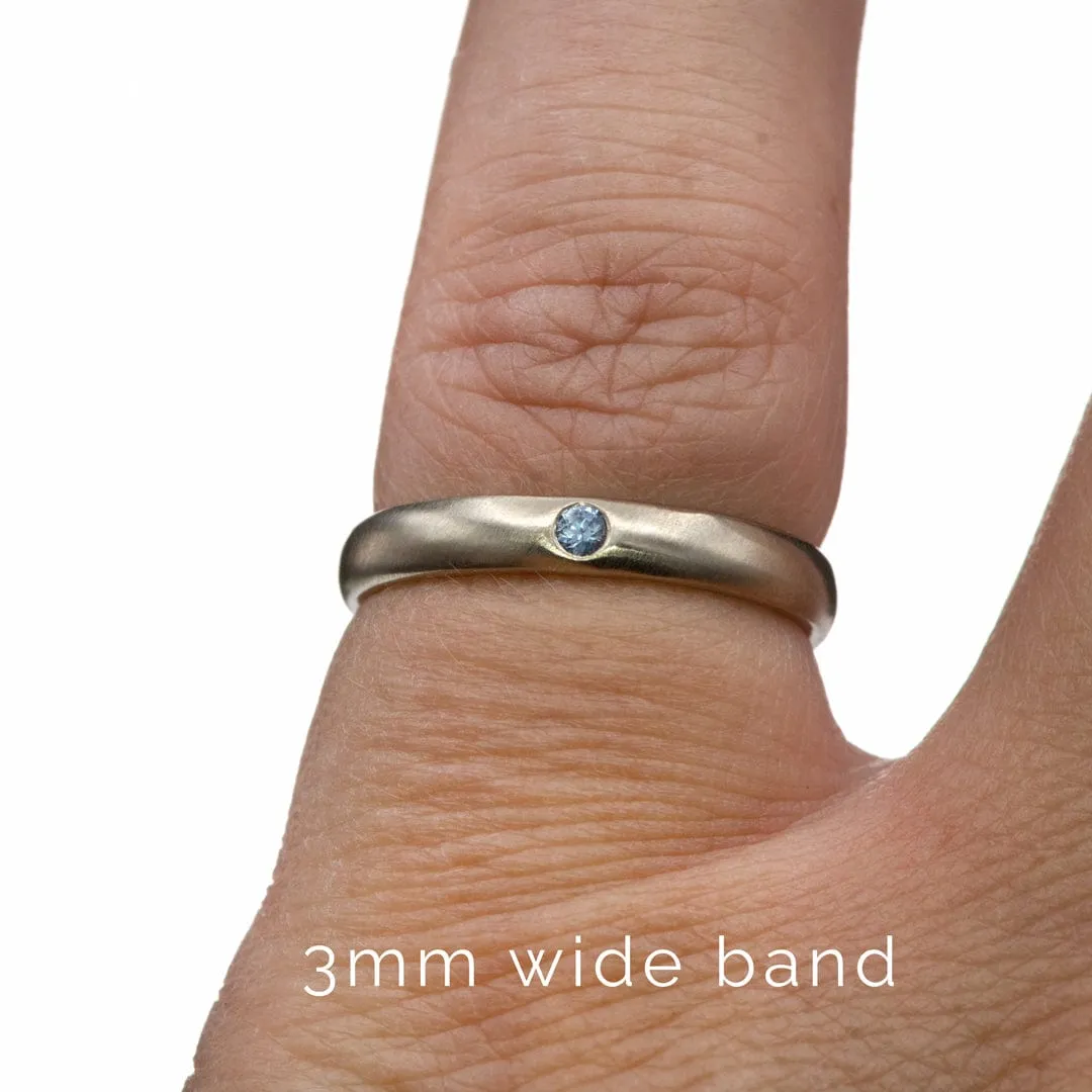 Domed Wedding Band with Flush set Montana Sapphire