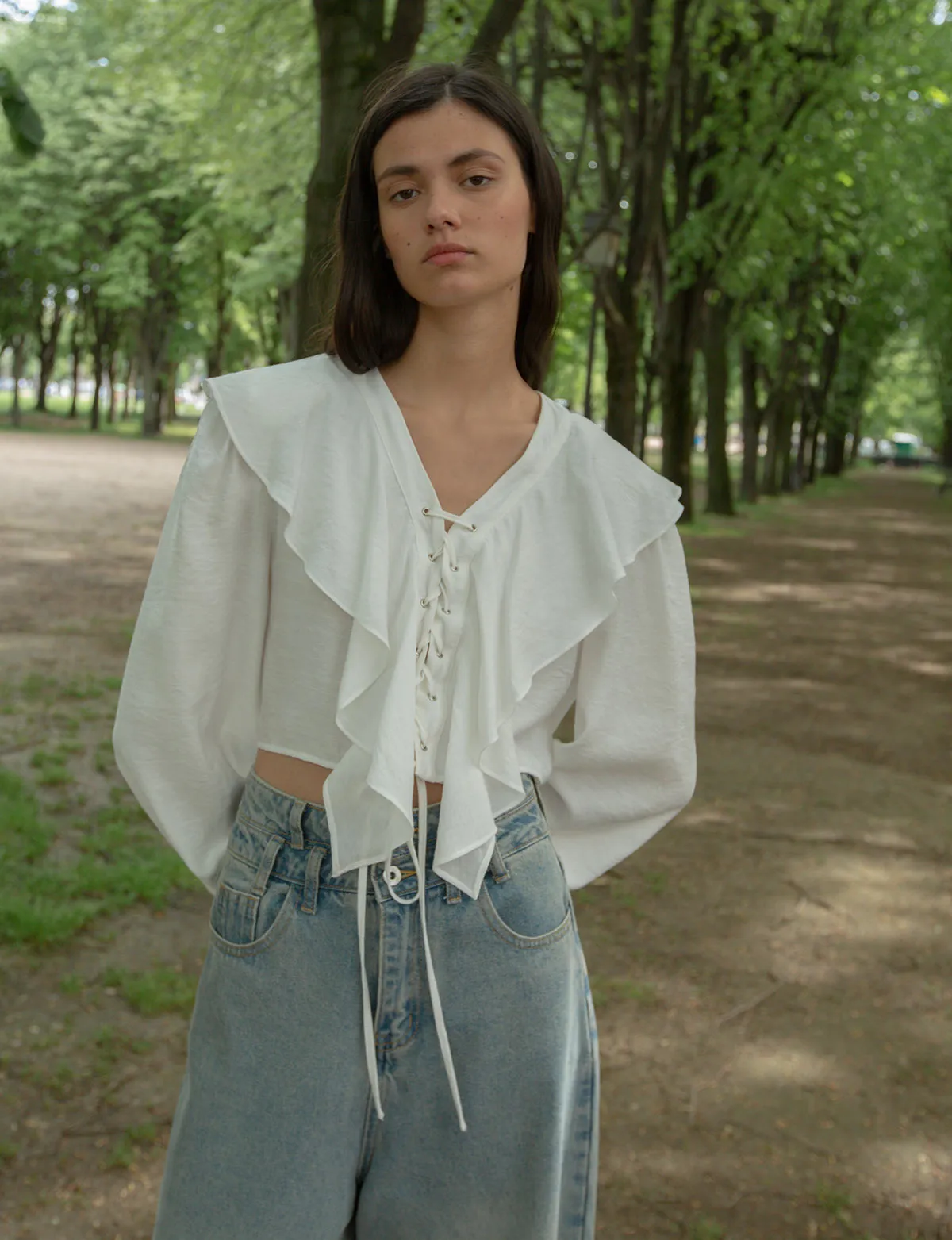 Ruffled Lace Up Blouse