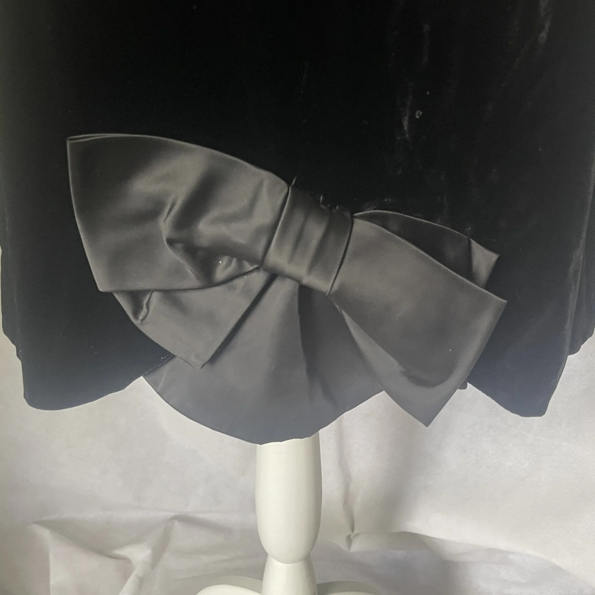 Vintage Elegant Black Velvet Cocktail Dress by Miss Elliette with a Satin Bow Accent. Formal Black Tie Attire.